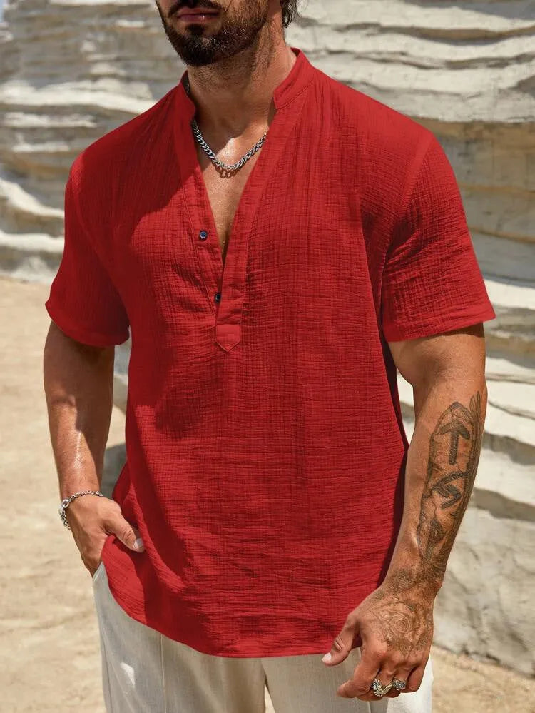 Men's solid colour short-sleeved shirt with a stand collar on a hanger