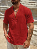 Men's solid colour short-sleeved shirt with a stand collar on a hanger