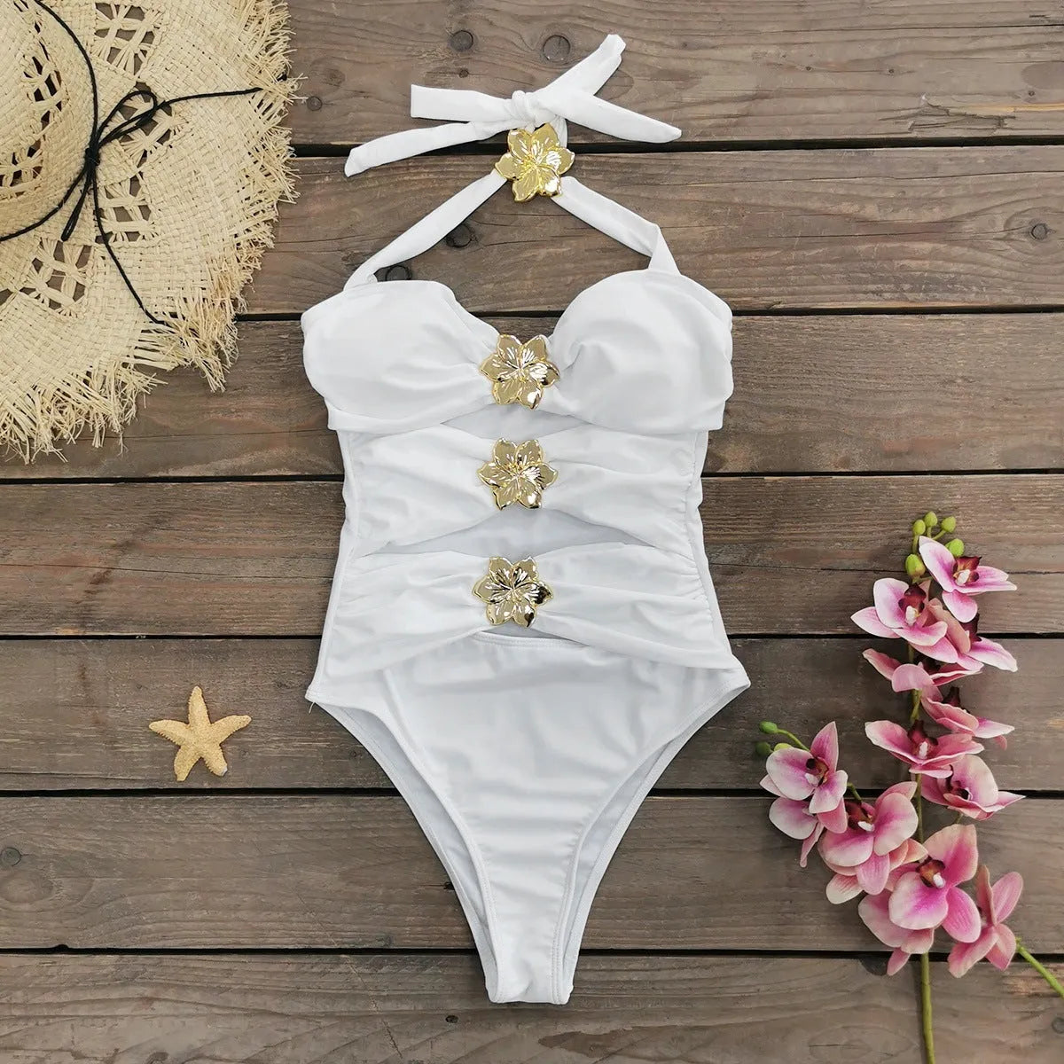 Solid colour high-waisted one-piece swimsuit with hollow-out tube top and matching short skirt for women.