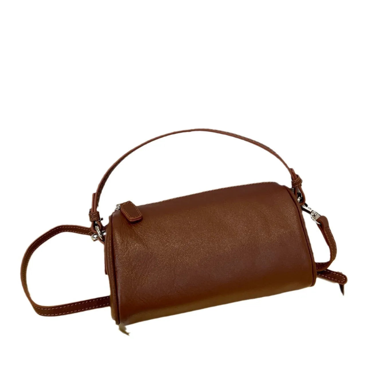 Soft genuine leather cylindrical crossbody phone bag in street style with sewing thread detailing