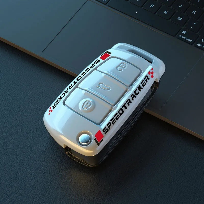 Carbon fibre style car key cover with mirror in feilin material, shown in carbon colour.