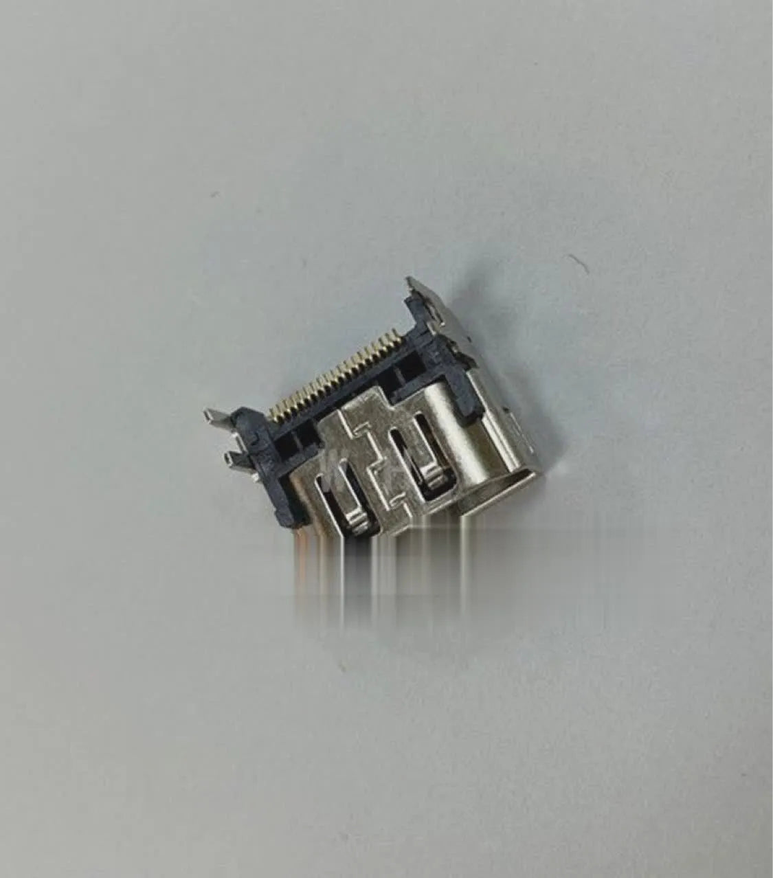 Silver HDMI interface host socket with metal construction for game consoles and computer hardware
