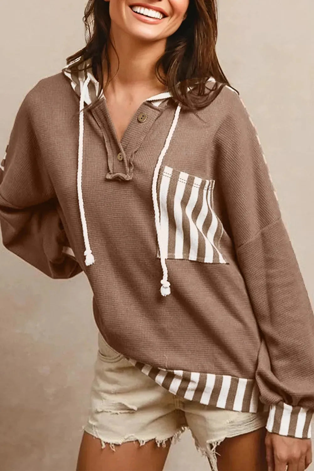Straw yellow waffle texture striped patchwork women's hoodie with button neck and drawstring hood