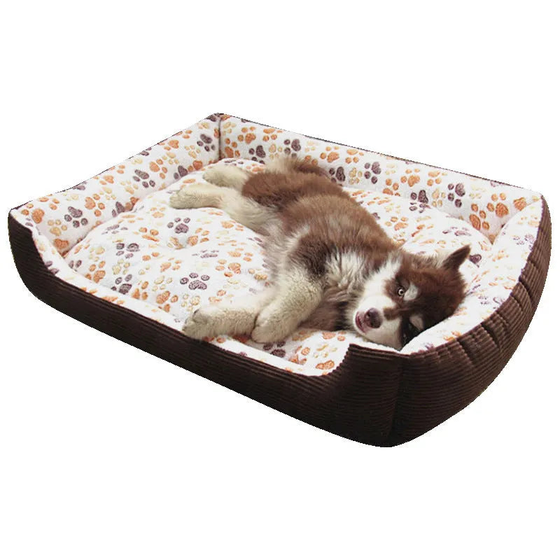 Soft beige plush dog bed with raised sides in a sofa-style design for small pets.