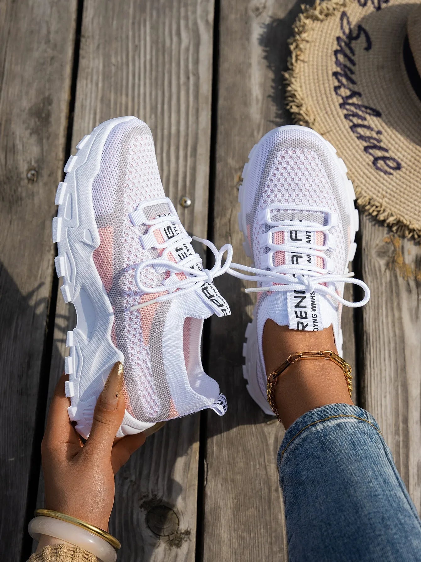 Women's Flyknit lace-up sneakers in a selected colour with a low rubber sole and round toe