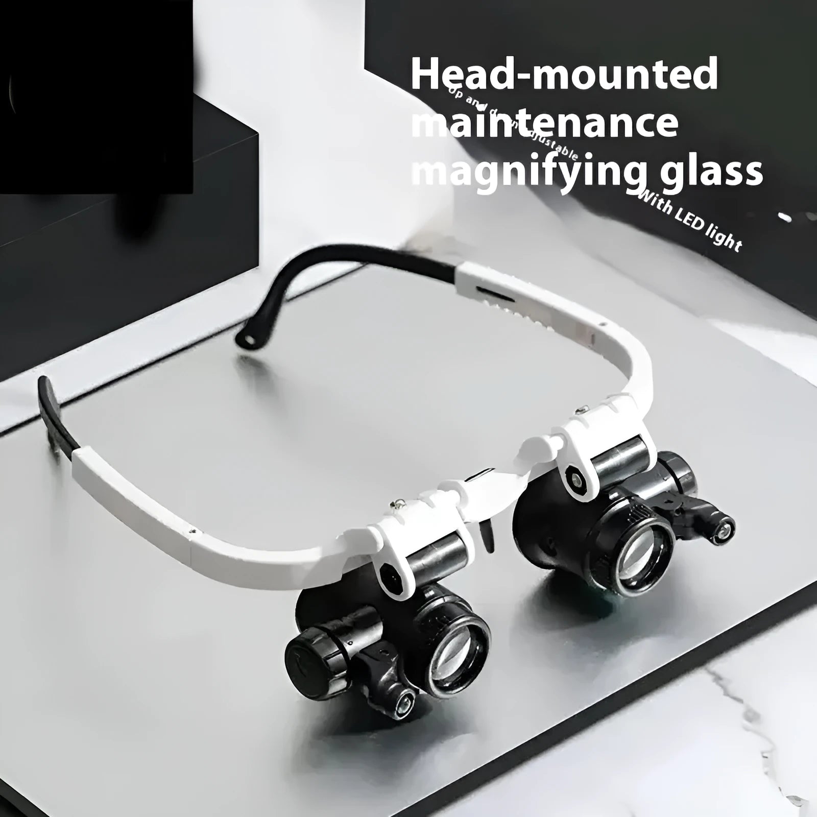 White head mounted magnifying glass with LED light, shown in unfolded position for use on a workbench.