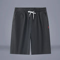 Cotton and linen cropped trousers with drawstring waist in solid colour on hanger