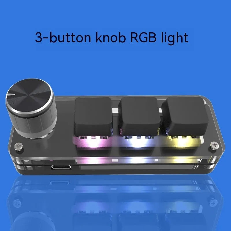 Black RGB backlit mini keyboard with copy and paste keys on desk