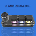 Black RGB backlit mini keyboard with copy and paste keys on desk