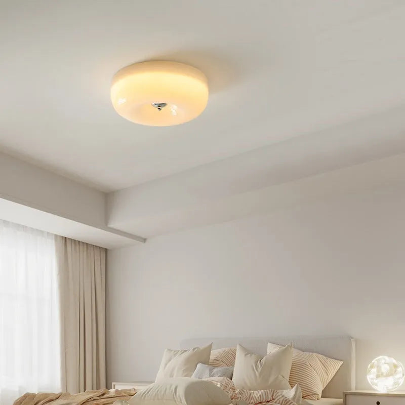 Cream coloured American style bedroom ceiling lamp with three light colour settings