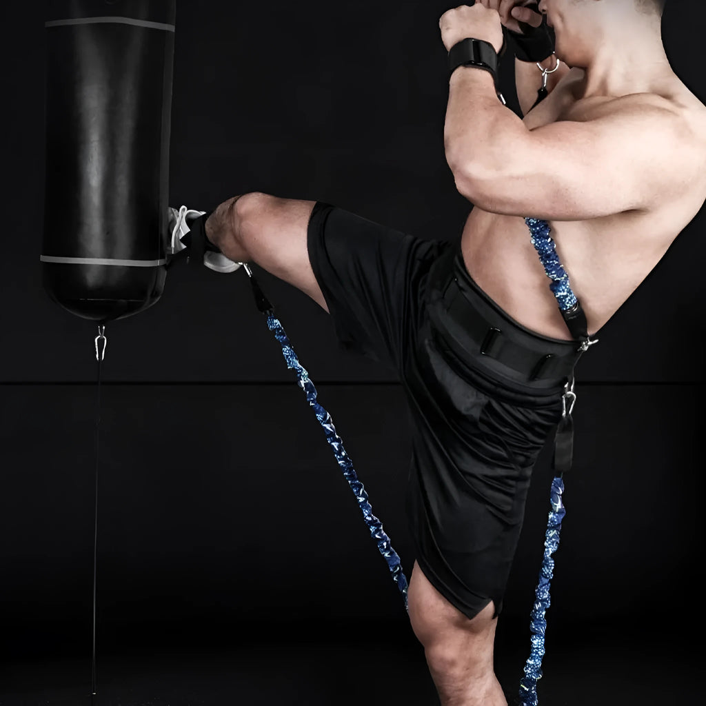 TPE elastic fitness resistance band with red, blue, black, and green colour sleeves indicating different pound ratings.
