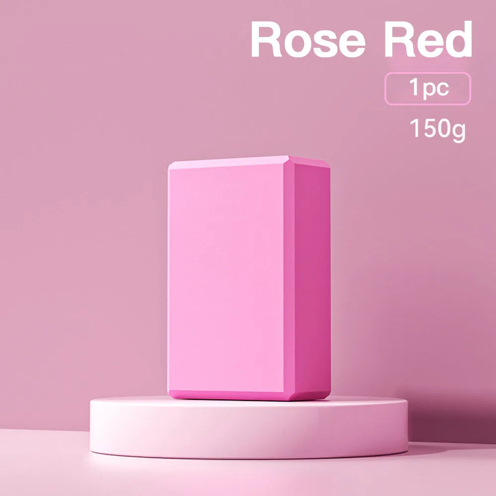 Solid colour EVA foam yoga block showing hexagonal facets and grip ridges