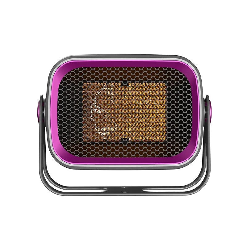 Compact white PTC ceramic desktop heater with rotatable body on a wooden desk.