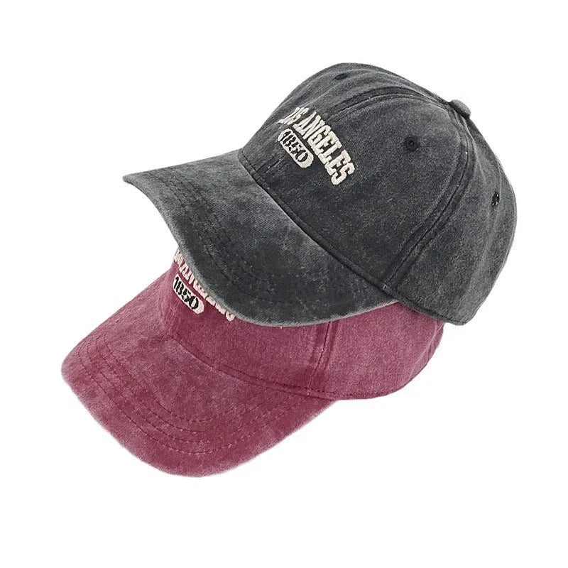 Retro personalised embroidered peaked cap in acrylic fabric with adjustable fit and distressed lettering
