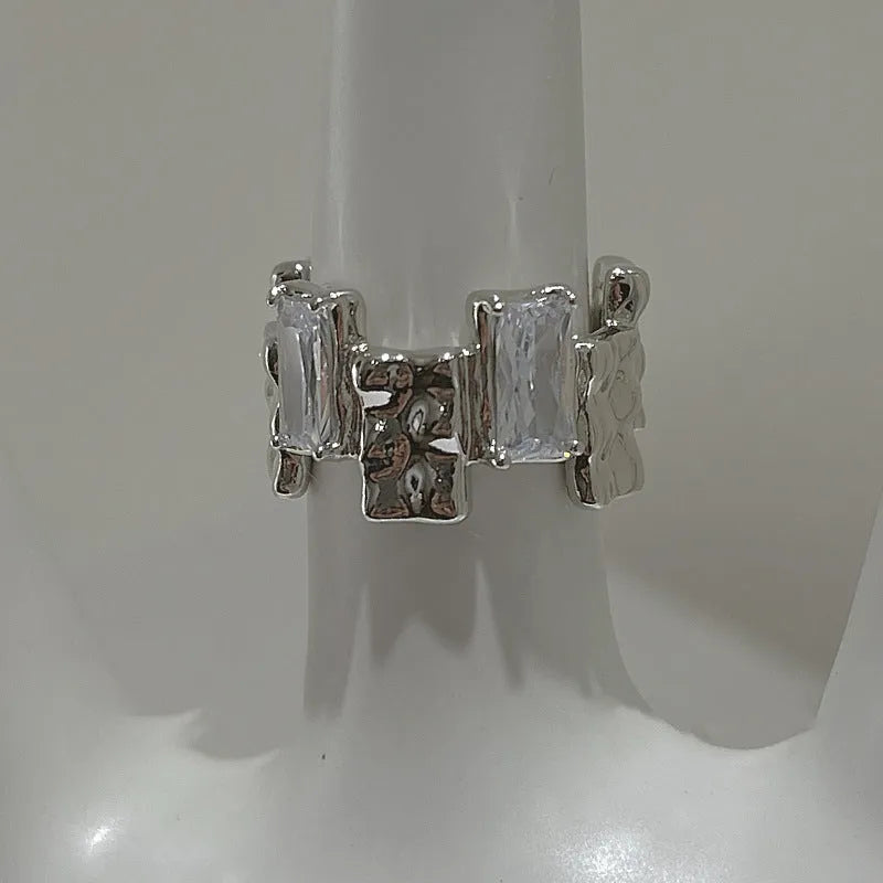 Open geometric zircon ring in silver colour with retro three-dimensional decoration