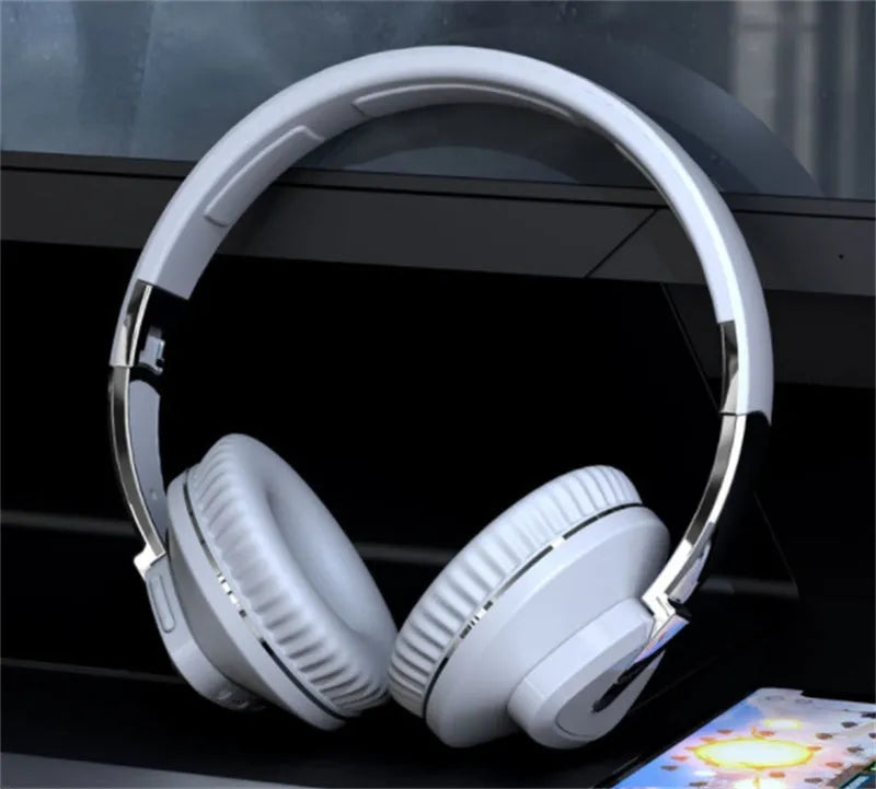 H3 wireless Bluetooth headset with all-inclusive ear design in black, white, blue, and khaki colour options