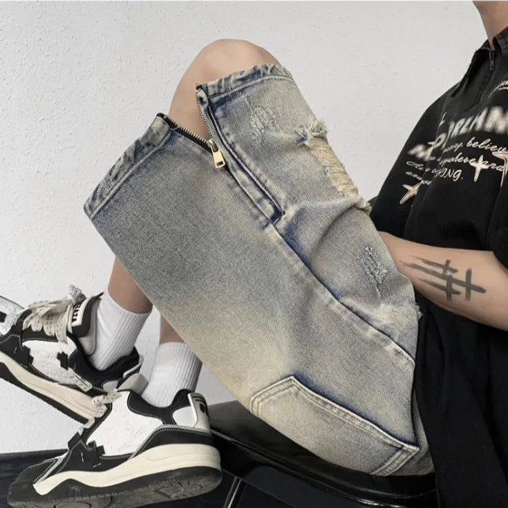 Blue wide-leg retro denim shorts on a neutral background