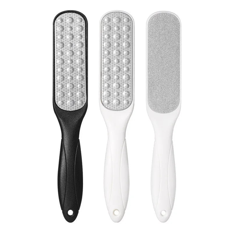 Stainless steel double-sided foot grinder tool for callus removal and foot care.