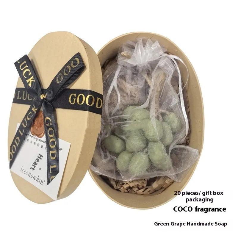 Grape handmade soap bars in black, green, purple and litchi variants showing mesh bag, gift box and long case packaging.