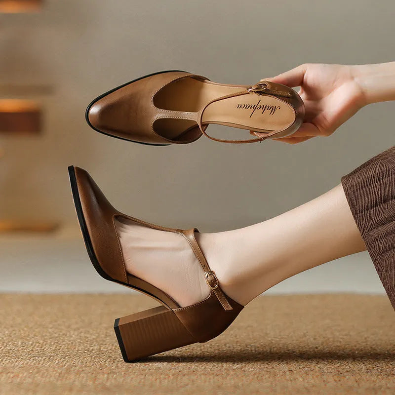 Women's dark brown hollow-out pointed toe buckle heels made from genuine cowhide leather.