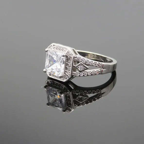 Platinum geometric zircon ring with hollow quadrilateral design on copper base