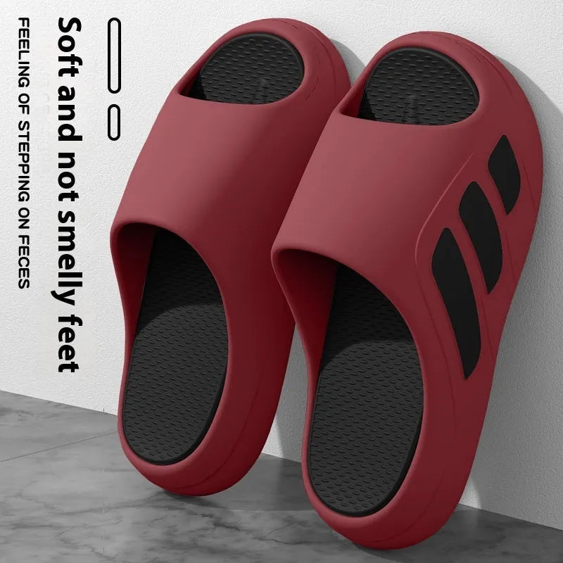 Brown unisex EVA platform flip flops with a thick sole and letter detailing for indoor use.