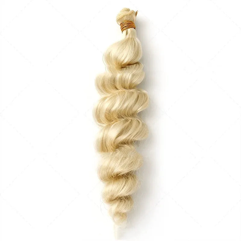 Golden synthetic hair weft in three lengths: 18in, 20in, 22in