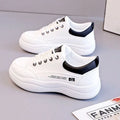 Women's white Korean-style lace-up pumps with cross straps and mid-heel design