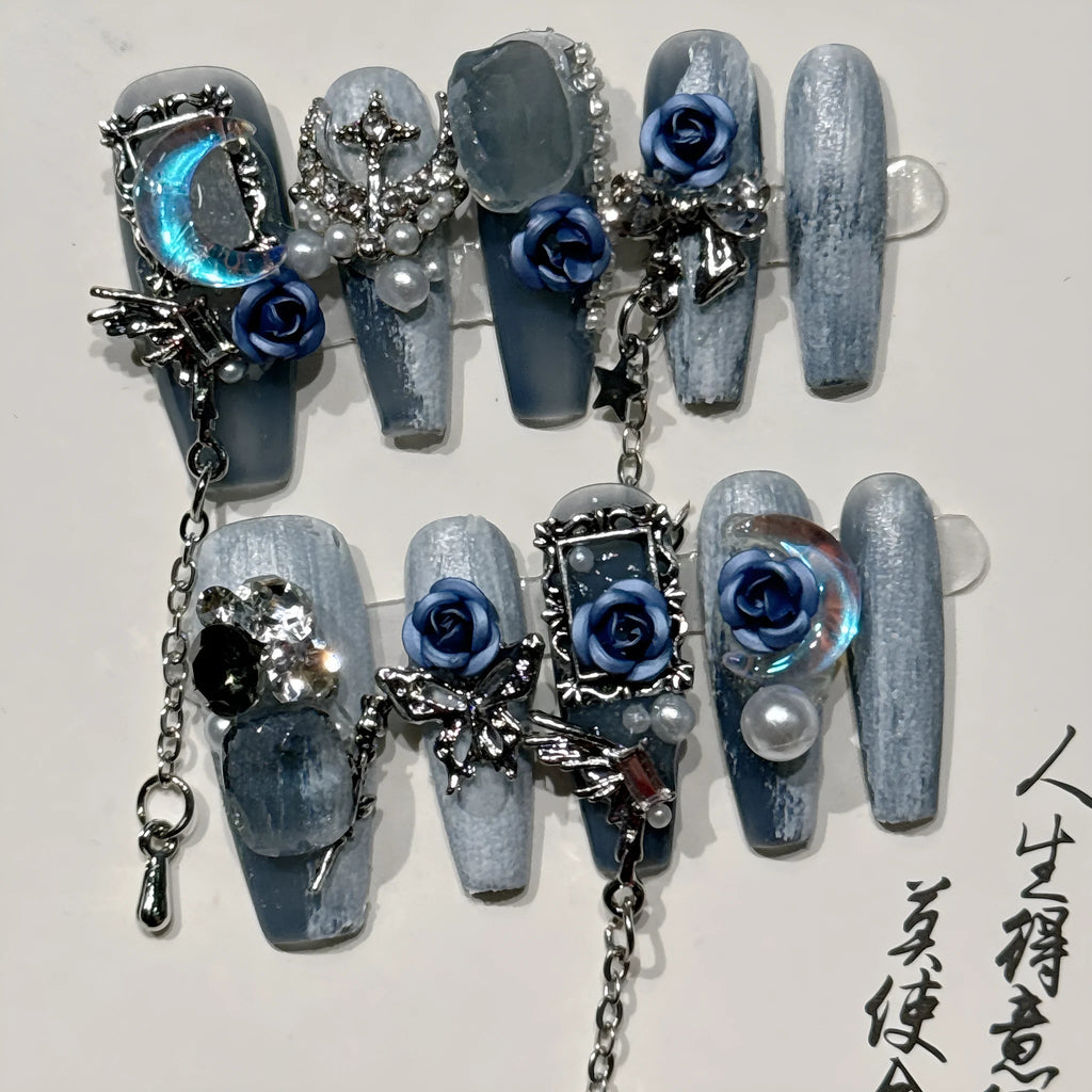 Blue manicure nails with rose tulip floral pattern in plastic armour construction