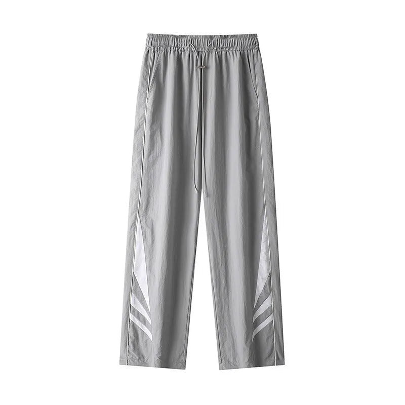 Men's straight-leg casual trousers in grey colour with elastic waistband and button fly