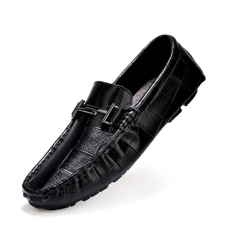 Men's black casual leather shoes with a belt buckle and flat rubber sole