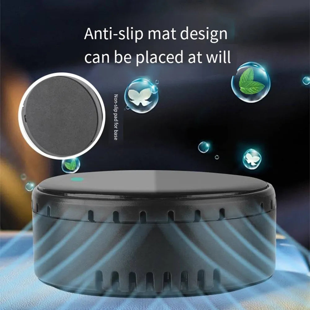 Black solar-powered car air humidifier mounted in a vehicle air conditioning vent