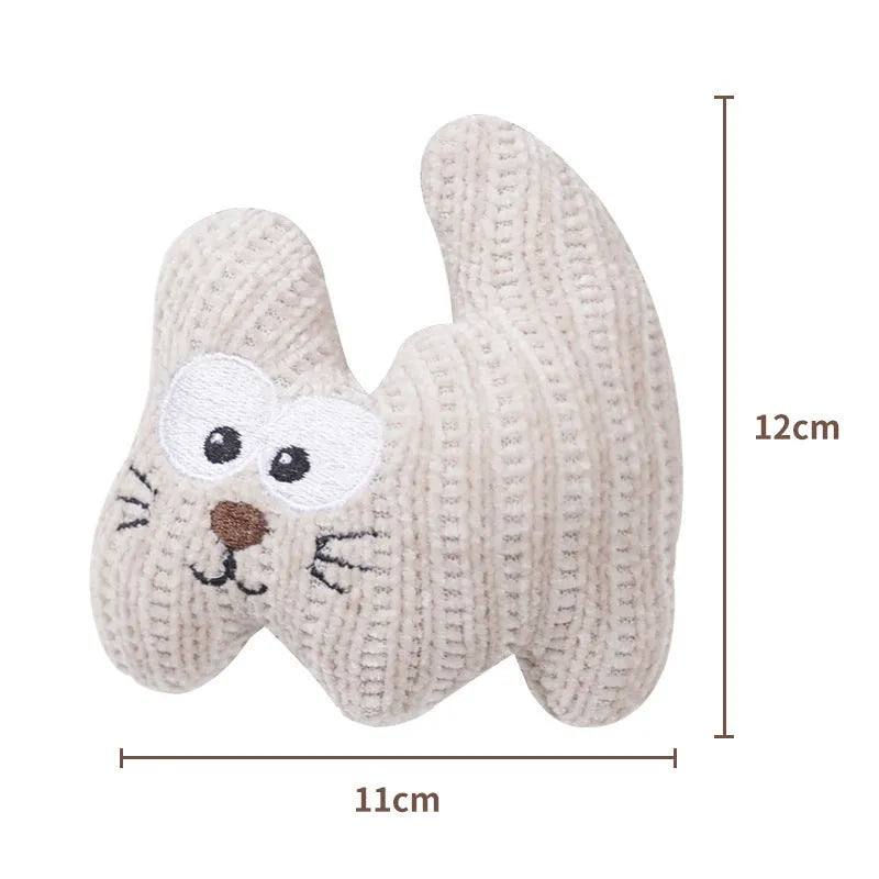 Cyan knitted plush cat toy with bell and catnip filling on a white surface.