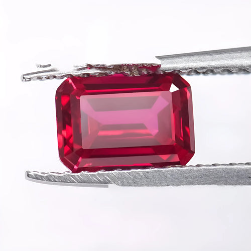 Artificial pigeon blood red ruby gemstone in various cuts: egg, round, princess, water drop, grandmother, and Asche.
