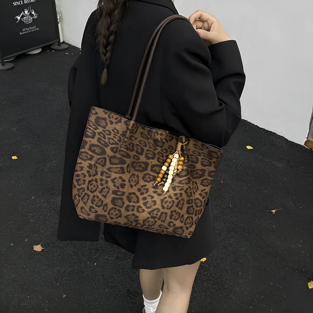 Leopard print polyester hand-held tote bag with double shoulder straps on a white background