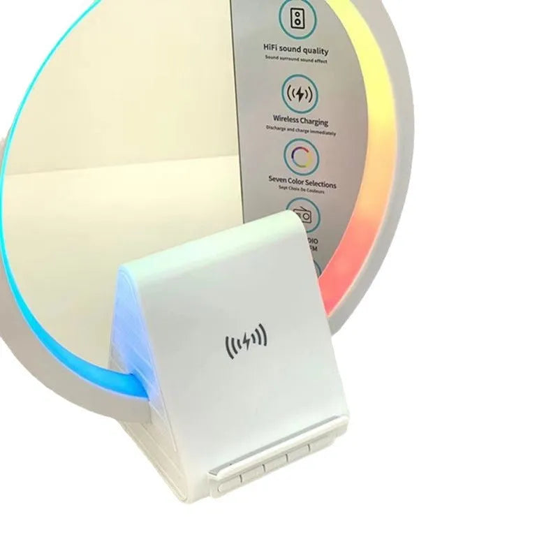 White Bluetooth speaker with wireless charging surface and ambient lighting