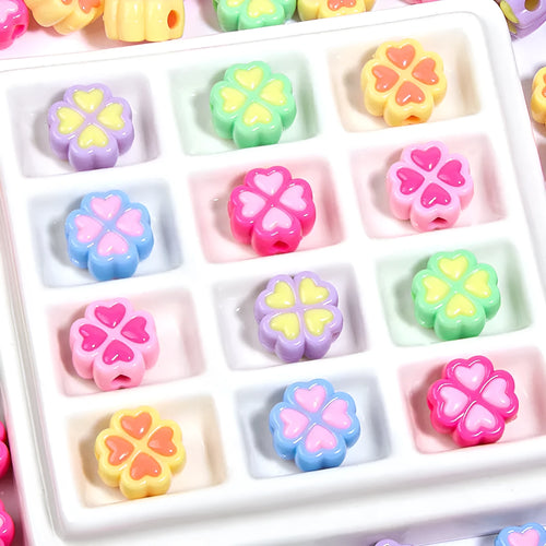 Acrylic four-leaf clover beads with frosted finish in mixed cartoon colours