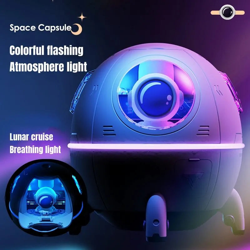 Purple astronaut-shaped USB desktop humidifier with colourful LED light on a desk