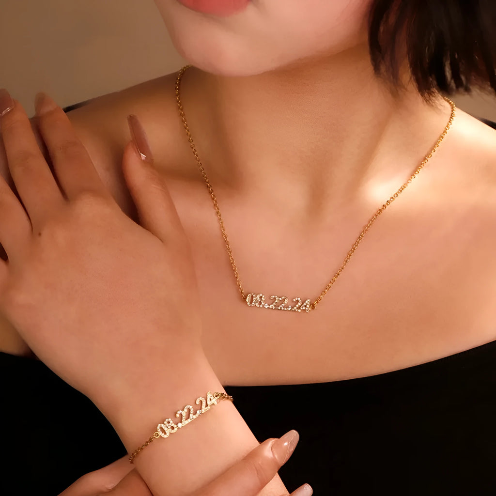 Stainless steel digital bracelet with diamond-set numbers in gold, rose gold, or steel colour.