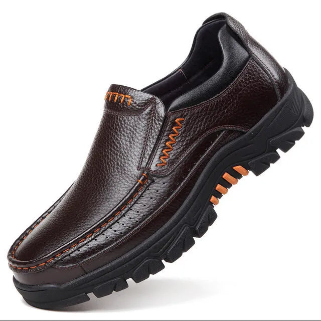 Men's black cowhide leather slip-on business casual shoes with a rubber sole.