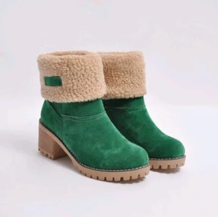 Women's black suede mid-tube knight snow boots with a thick sole and low flat heel on a plain background.