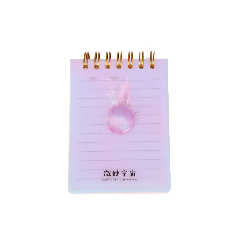Set of four A7 spiral notebooks with different coloured PP plastic covers, showing spiral binding and open page.