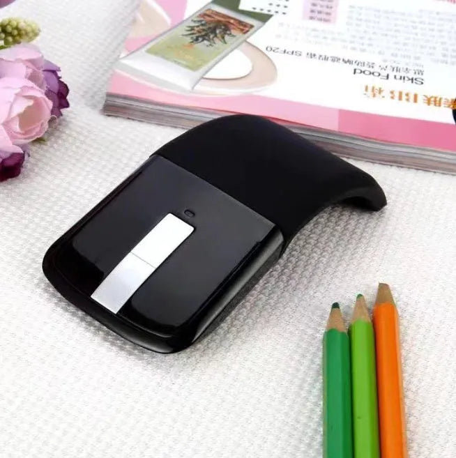 Folding Bluetooth touch wireless mouse shown open and closed with black, white, blue, green colour options