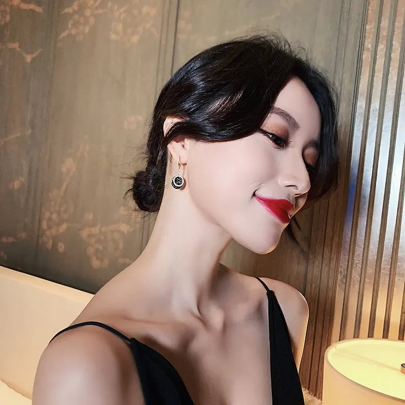 Black retro Hong Kong style geometric earrings with 3.6cm length and alloy construction