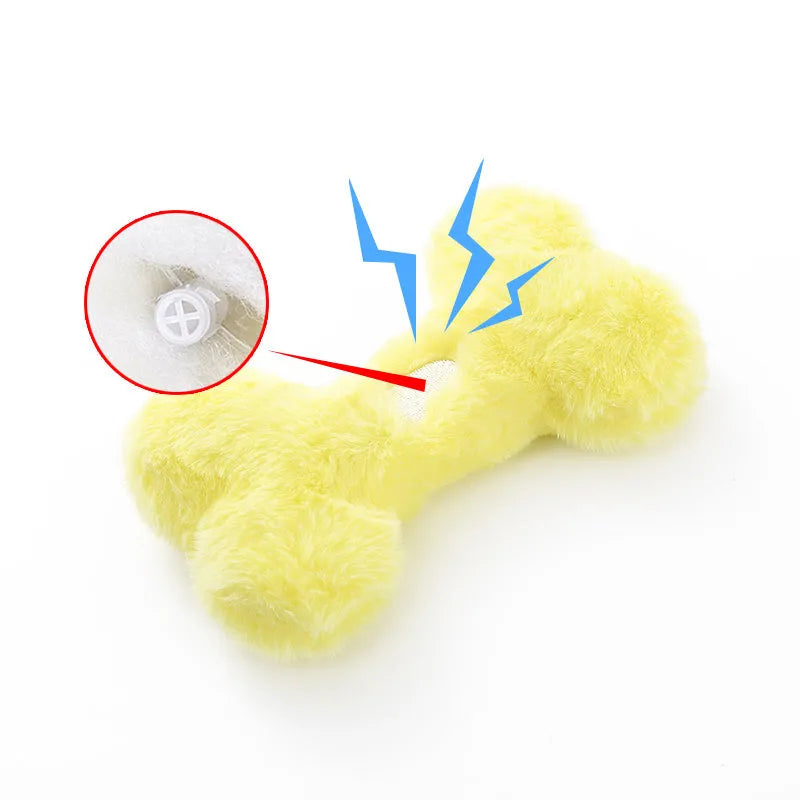Soft blue plush love bone dog toy with a squeaker for interactive play.