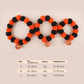 Naughty cat collar with pumpkin trick or treat design and bell ball in Halloween style
