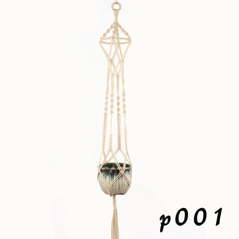 Woven wire basket made of cotton rope shown in a desktop setting.