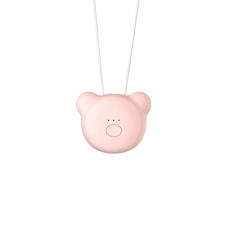 Mini USB air purifier necklace in pink showing compact wearable design with one-button control