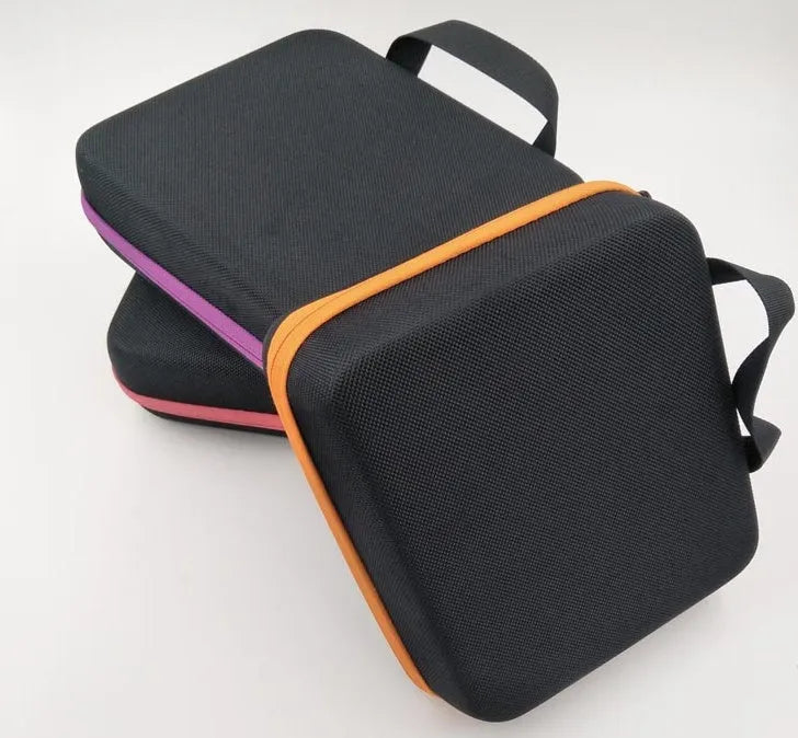 Red EVA essential oil storage bag with 30 compartments for 15ml bottles, shown with zipper closed