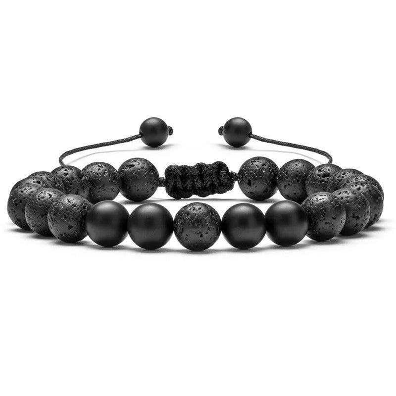A pair of matte black agate bead bracelets with geometric design for him and her.